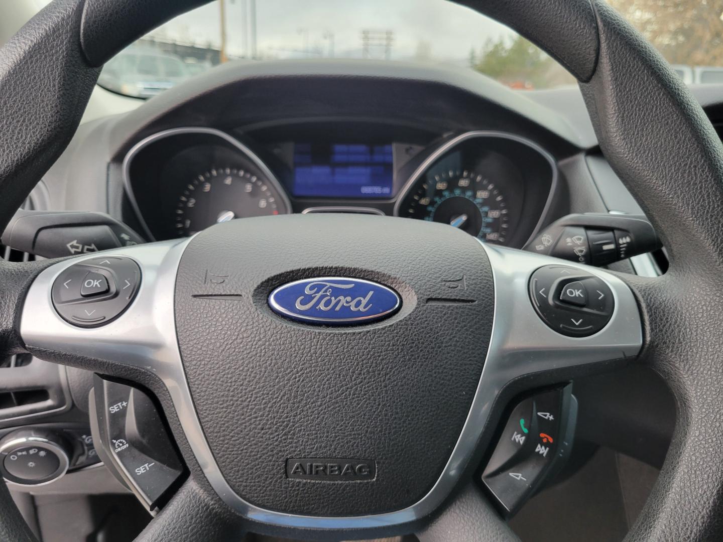 2013 White /Black Ford Focus SE (1FADP3F23DL) with an 2.0L I4 engine, 6 Speed Automatic transmission, located at 450 N Russell, Missoula, MT, 59801, (406) 543-6600, 46.874496, -114.017433 - Great Little Sedan. Excellent Fuel Economy. Only 69K Miles! Heated Seats. Air Cruise Tilt. Power Windows and Locks. AM FM CD XM Bluetooth. - Photo#16